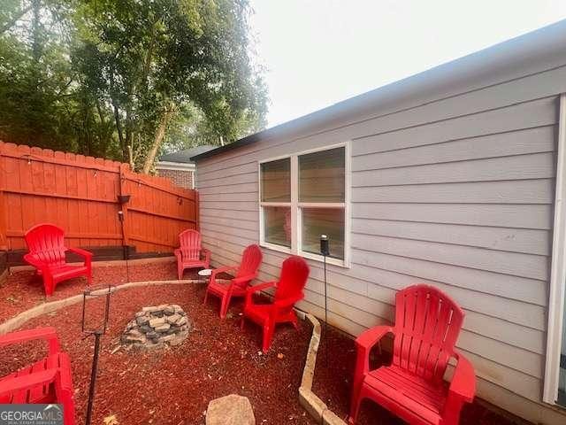 view of patio featuring an outdoor fire pit