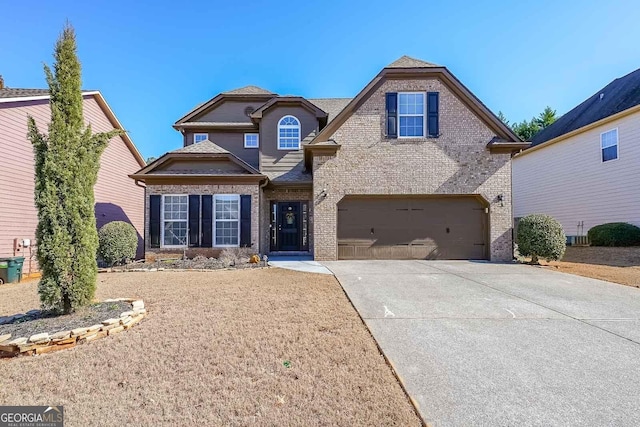 front of property with a garage