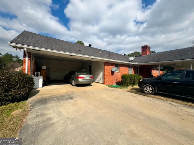 ranch-style home with a carport