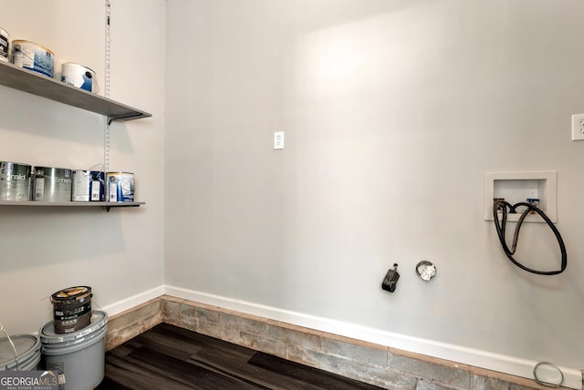 laundry room with washer hookup, laundry area, and dark wood finished floors