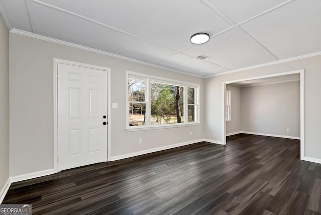 entryway with baseboards, dark wood-type flooring, and crown molding