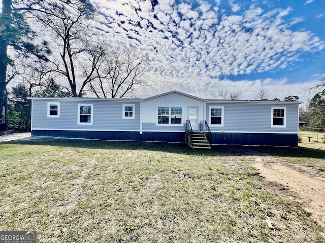 view of front facade with a front yard