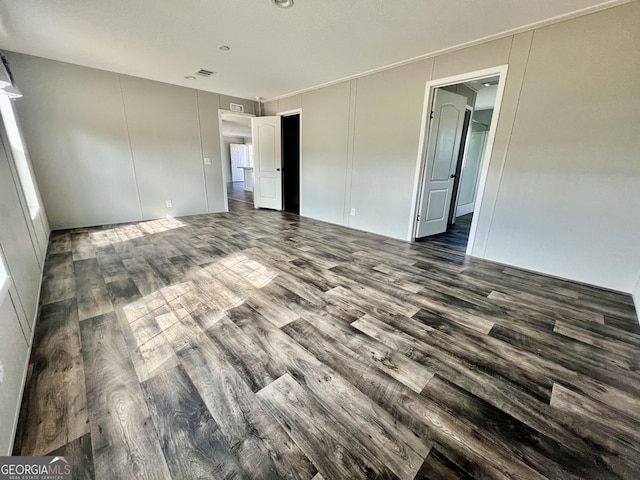 interior space with dark hardwood / wood-style flooring