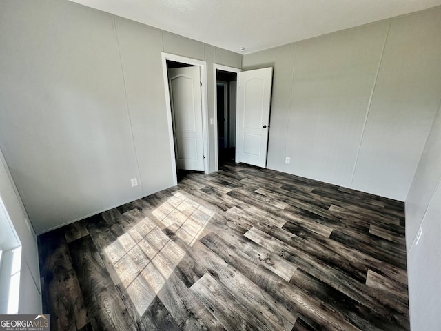 unfurnished bedroom featuring wood-type flooring