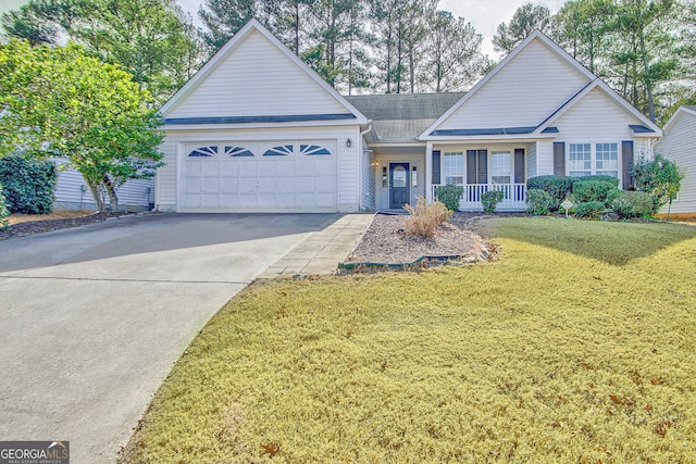 ranch-style house featuring a front lawn, a garage, and a porch