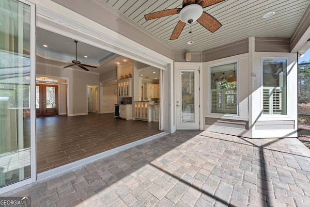 view of patio featuring ceiling fan