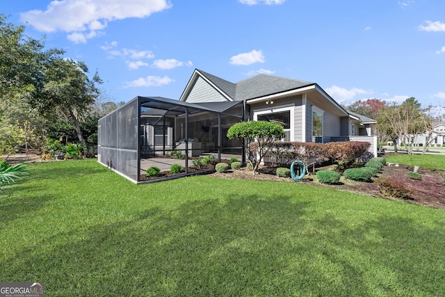 exterior space featuring a front lawn and a lanai