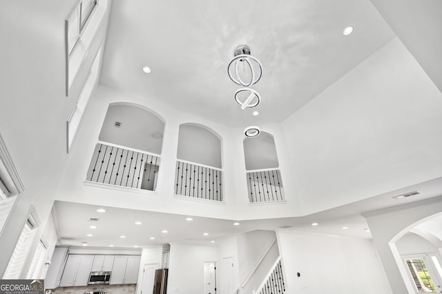 868 Still Hill Ln, Lawrenceville, GA 30045 - kitchen view of appliances with stainless steel finishes, recessed lighting, and arched walkways
