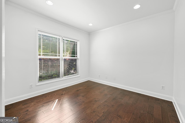 868 Still Hill Ln, Lawrenceville, GA 30045 - spare room with dark wood-type flooring, crown molding, and recessed lighting