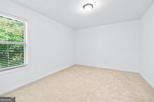 868 Still Hill Ln, Lawrenceville, GA 30045 - carpeted spare room with baseboards