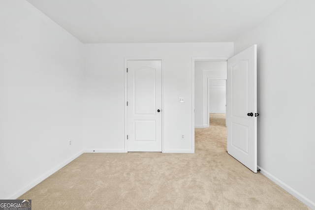 868 Still Hill Ln, Lawrenceville, GA 30045 - unfurnished bedroom with carpet floors and baseboards