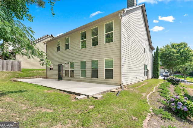 868 Still Hill Ln, Lawrenceville, GA 30045 - back of house featuring a patio and a chimney