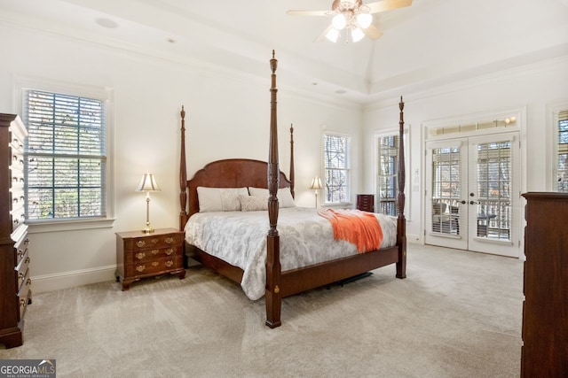 carpeted bedroom featuring ceiling fan, crown molding, french doors, and access to exterior