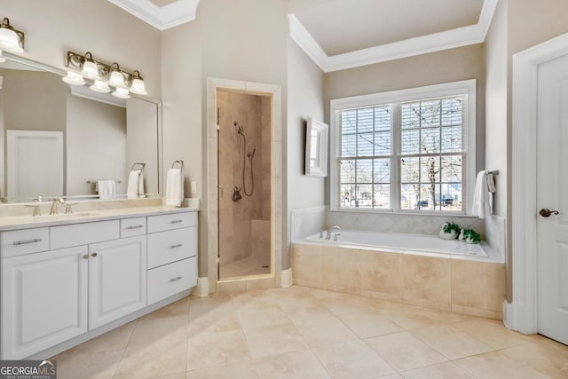 bathroom featuring ornamental molding, plus walk in shower, vanity, and tile patterned floors