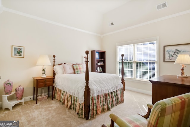 carpeted bedroom with lofted ceiling and crown molding