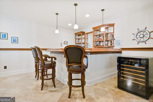 bar with decorative light fixtures, butcher block countertops, and crown molding