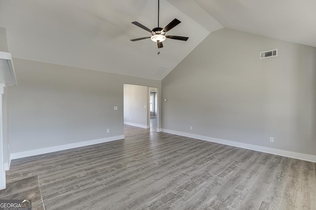 unfurnished room featuring light wood-style floors, visible vents, baseboards, and a ceiling fan