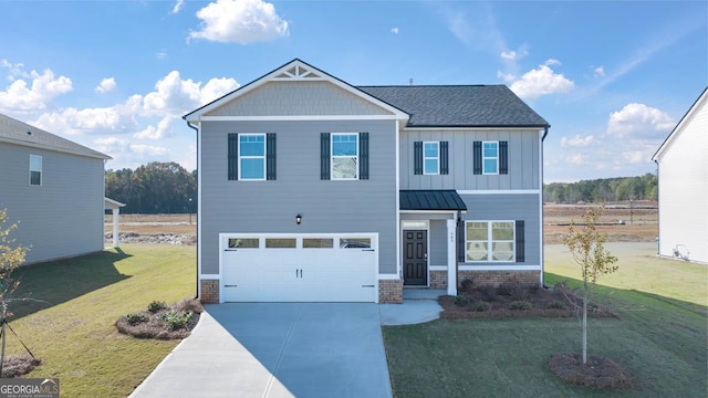 view of front of house with a front lawn and a garage