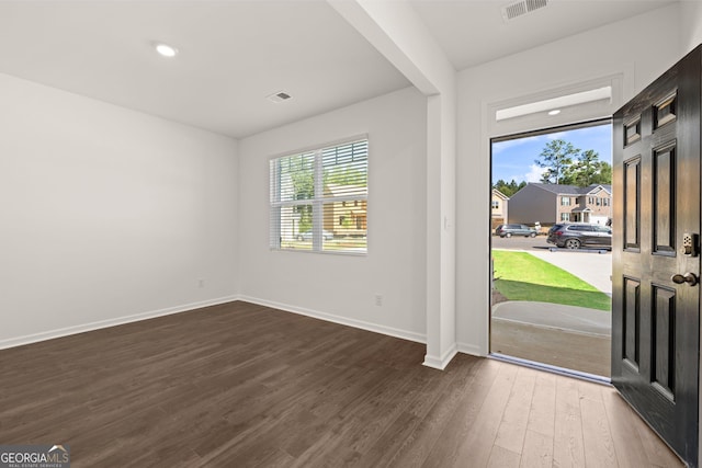 entrance foyer featuring dark wood-type flooring