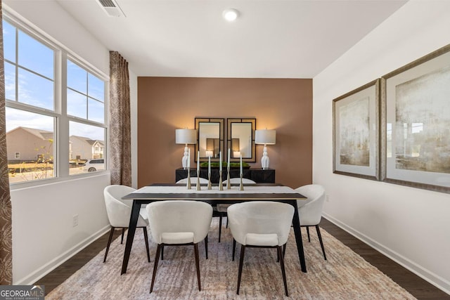 dining room featuring dark hardwood / wood-style flooring