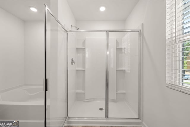 bathroom with independent shower and bath