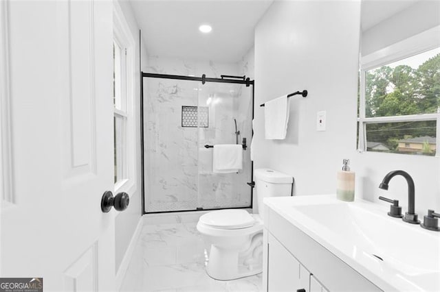 full bathroom with marble finish floor, toilet, vanity, and a marble finish shower