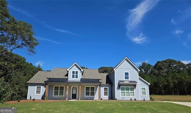 view of front of home with a front yard