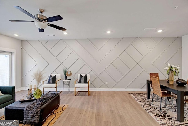 interior space with light wood-style floors, baseboards, visible vents, and recessed lighting