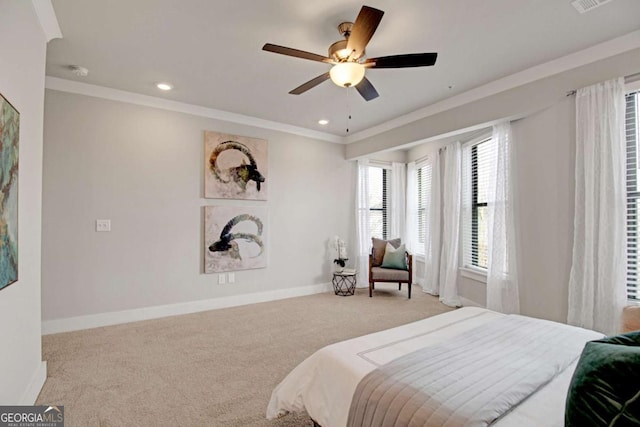 bedroom with recessed lighting, light colored carpet, ornamental molding, ceiling fan, and baseboards