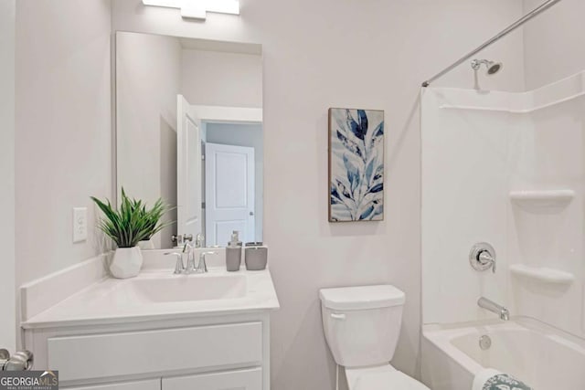 full bath with shower / bath combination, toilet, and vanity