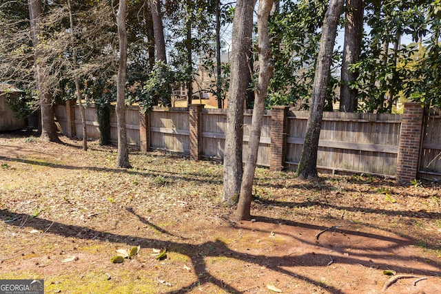 view of yard with fence