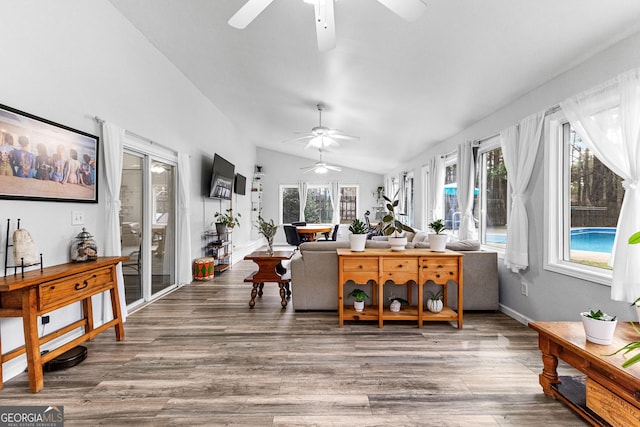 interior space featuring lofted ceiling and a wealth of natural light