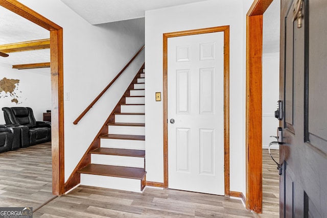 foyer with light wood-type flooring