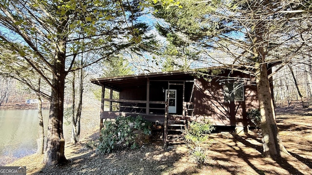 view of outdoor structure with a water view