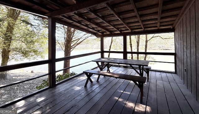 dock area with a water view