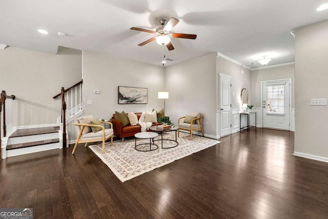 living room featuring ceiling fan, crown molding, and dark hardwood / wood-style floors