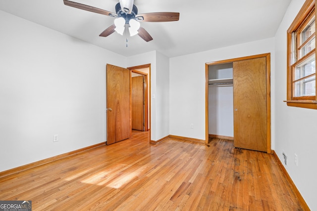 unfurnished bedroom featuring a closet, ceiling fan, and light hardwood / wood-style flooring