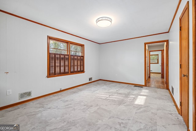 unfurnished room with wooden walls and ornamental molding