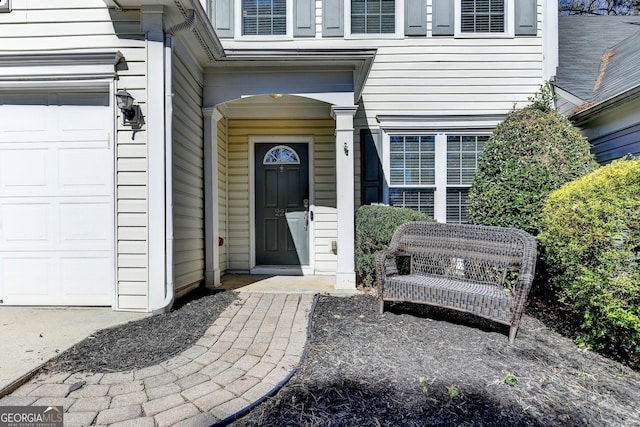 entrance to property with an attached garage