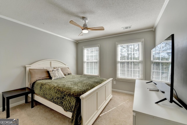 bedroom with ornamental molding, visible vents, and light carpet