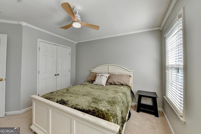 bedroom with crown molding and light colored carpet