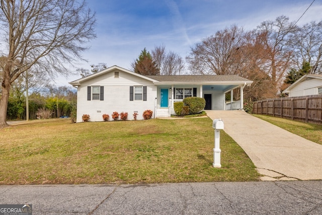 view of front of home featuring an attached carport, a front lawn, brick siding, and concrete driveway