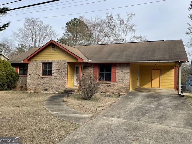 single story home featuring crawl space, driveway, roof with shingles, and brick siding