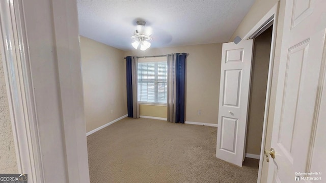 interior space featuring a textured ceiling