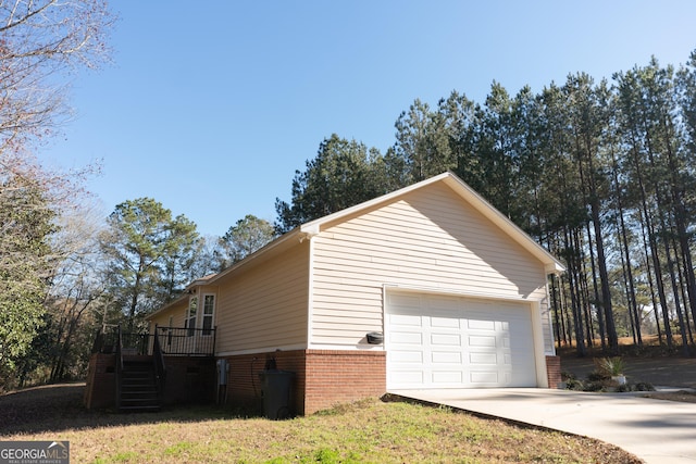 view of home's exterior with a wooden deck