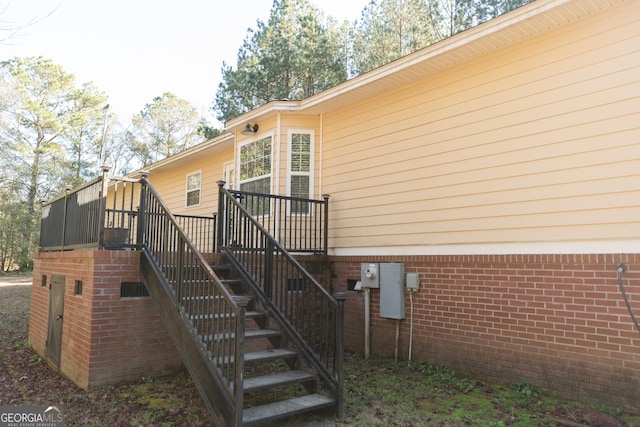 exterior space featuring a wooden deck