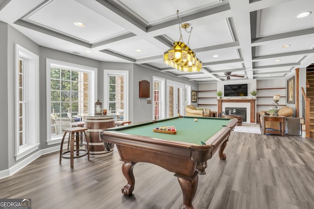 recreation room featuring ceiling fan, beamed ceiling, coffered ceiling, pool table, and wood-type flooring