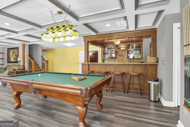 playroom featuring hardwood / wood-style floors, billiards, bar, beamed ceiling, and coffered ceiling