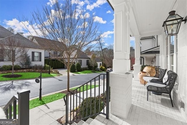 view of patio featuring a residential view