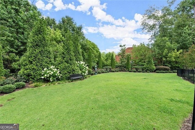 view of yard with fence